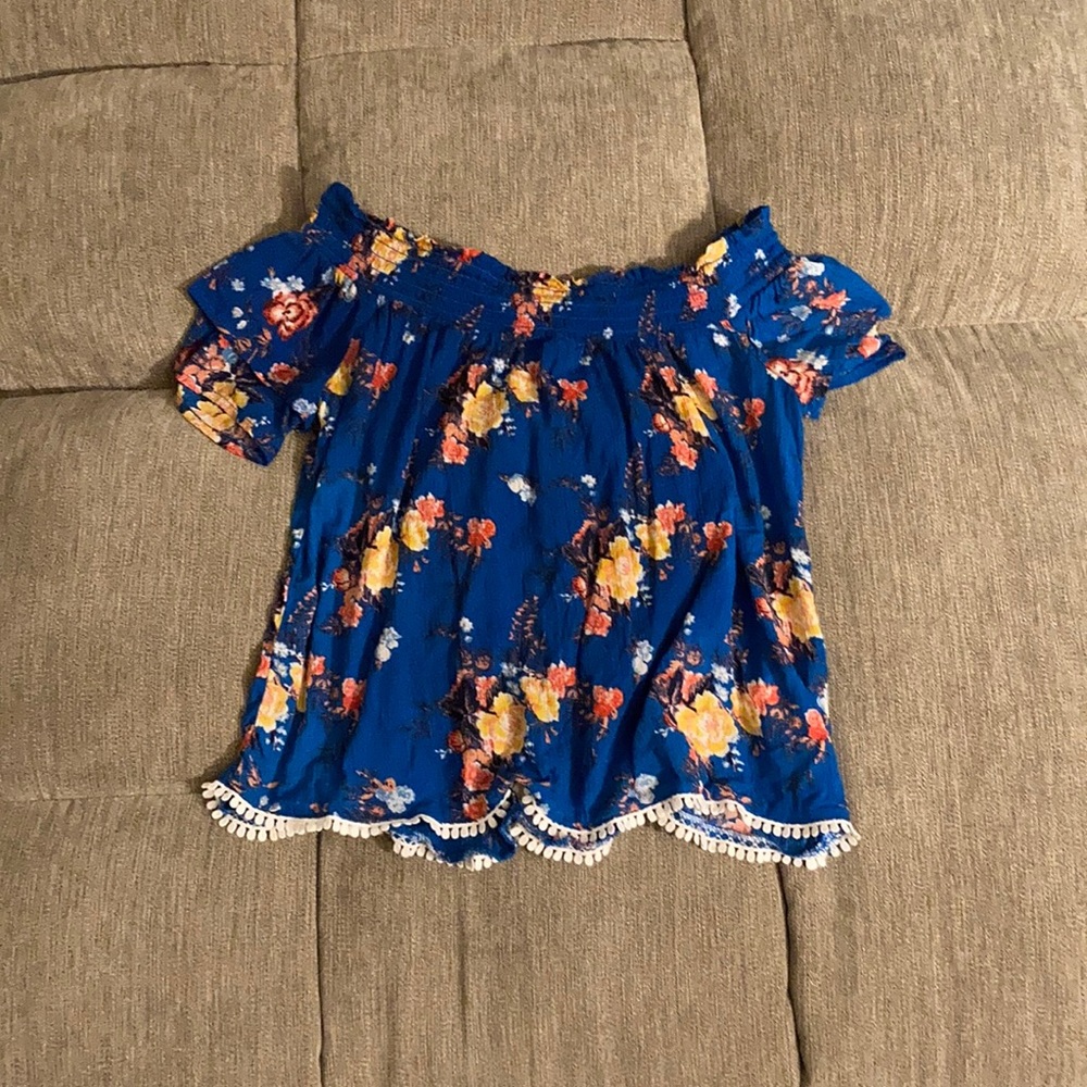 Blue flower off shoulder